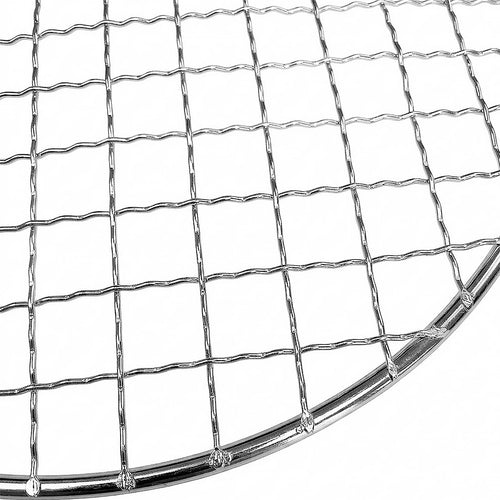 Close-up of a round barbecue grill grate with a wavy grid pattern and a polished silver rim, shown on a white background.