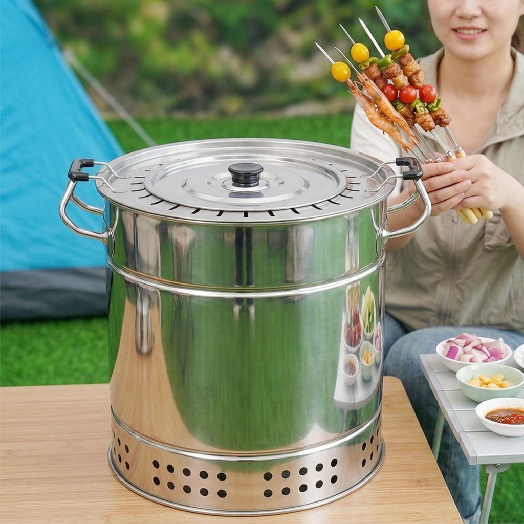 A woman in a tent camping ground holds colorful skewers next to a stainless steel vertical charcoal grill on a wooden table.