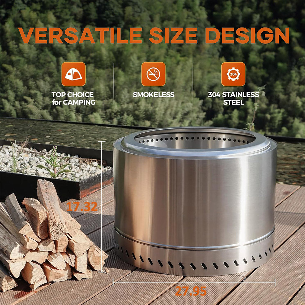 27-inch smokeless fire pit with a wood fire burning inside, set outdoors at night